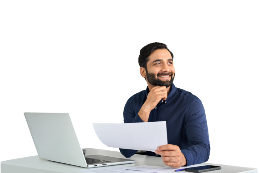 A smiling business person using a laptop computer