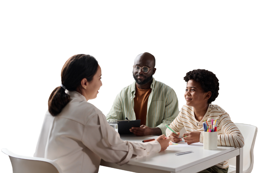 A teacher having a conversation with a student and parent