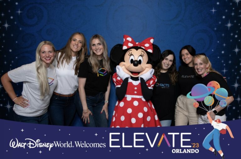 The FACTS Elevate team with Minnie Mouse