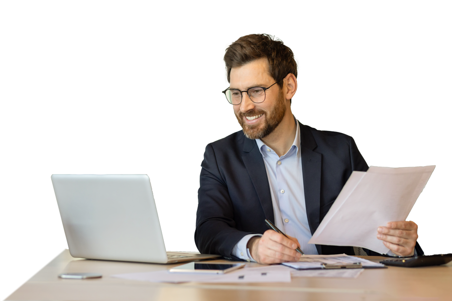 A smiling business professional at a desk