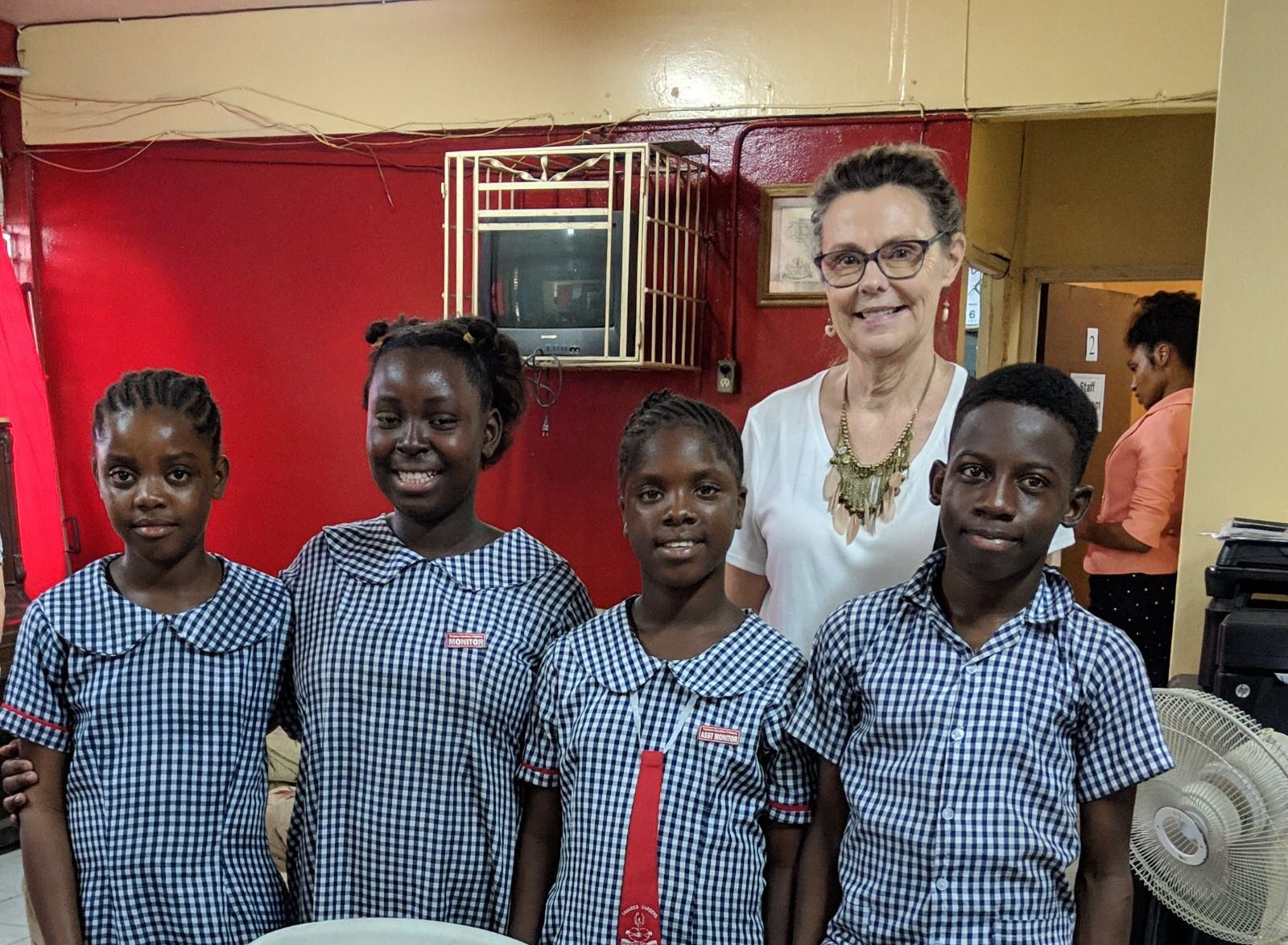 Cathie Morrissey of Jamaican Self-Help with students